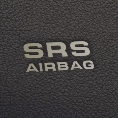 Кліше з написом SRS AIRBAG